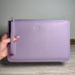 Personalised embossed saffiano zip clutch bag with wrist strap